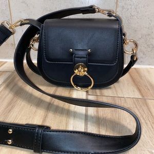 Francesca’s black crossbody bag. NEVER USED.